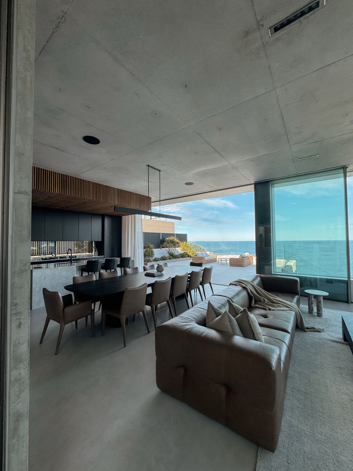 An open living space facing the water.