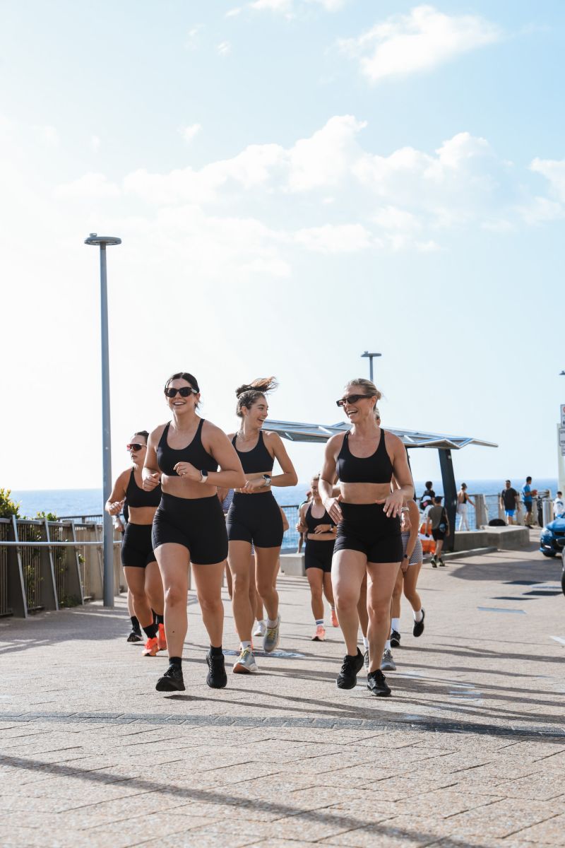 Runners making their way by the harbour.