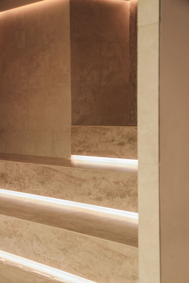 Warm stone with a quiet, natural pattern.